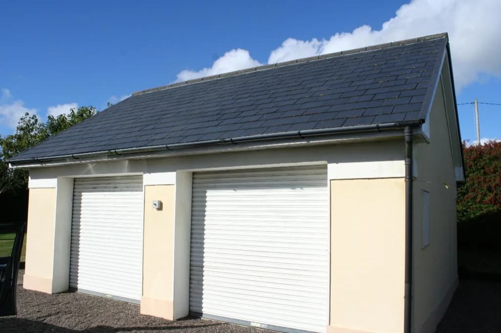 Garage with roller doors before conversion