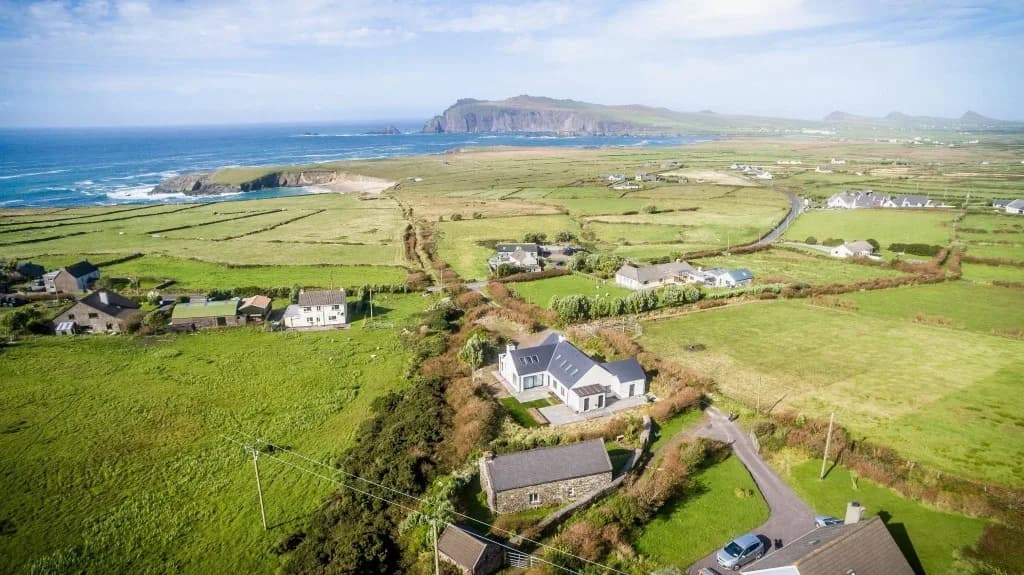 Aerial view of houses and fields above the Atlantic coast